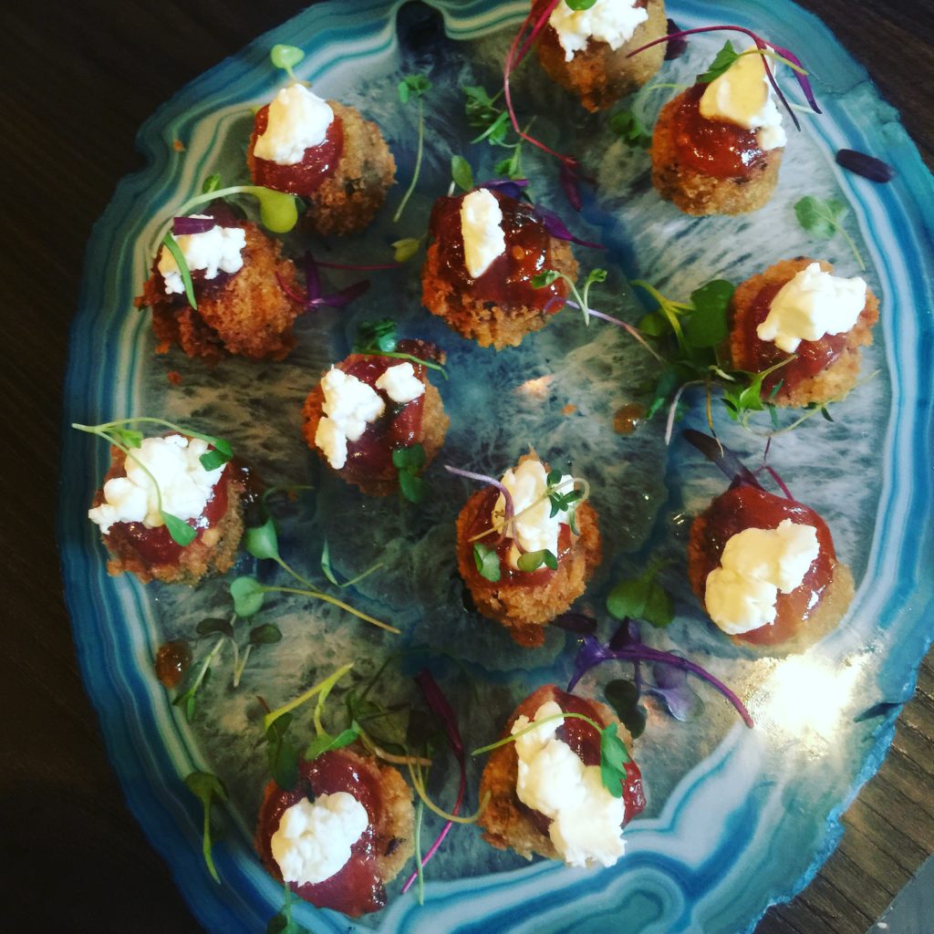 The Herb Box catering menu - wild mushroom risotto cakes with goat cheese and tomato jam
