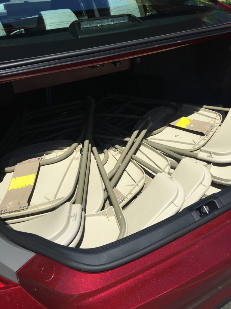 24 chairs not a problem and there is still space in the 2016 Toyota Camry 