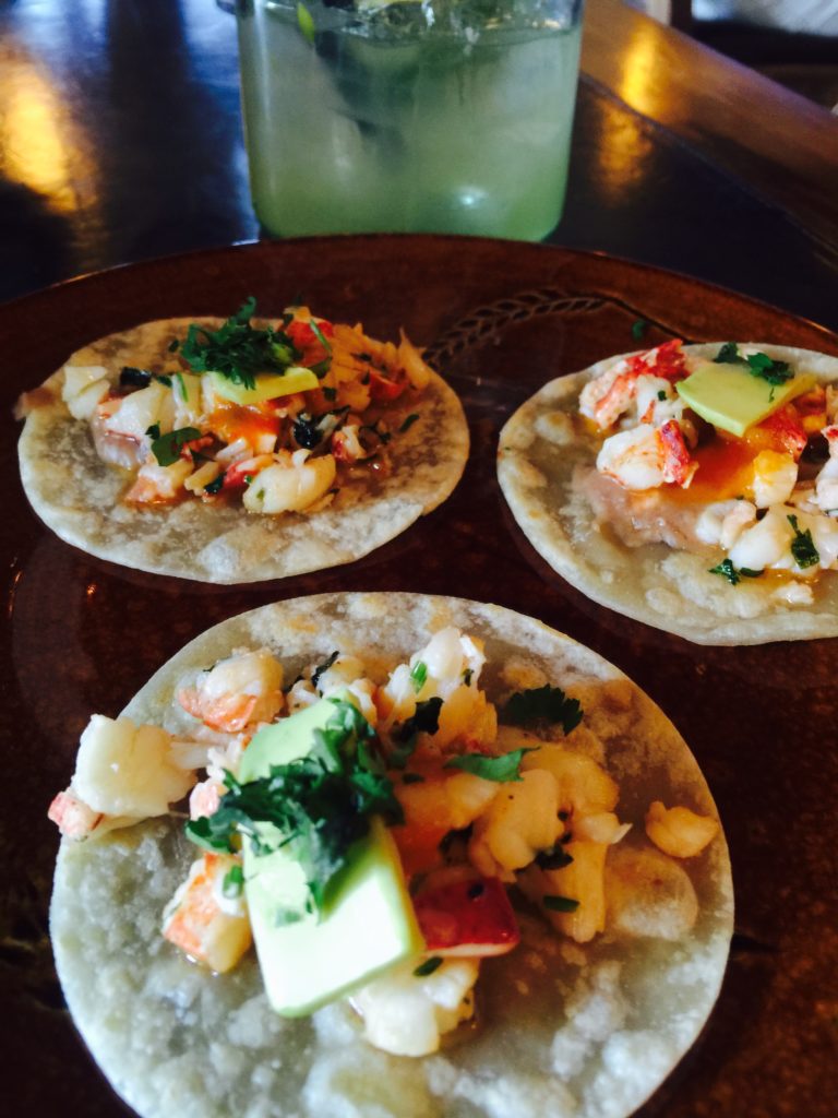 Trio of Lobster Tacos prepared with flour tortillas, refined beans, arbol chile, avocado and fresh lobster were an explosion of deliciousness 